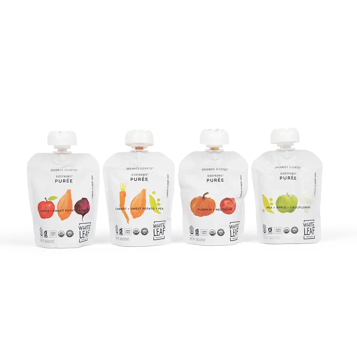 Four White Leaf Puree organic baby food pouches on a white background
